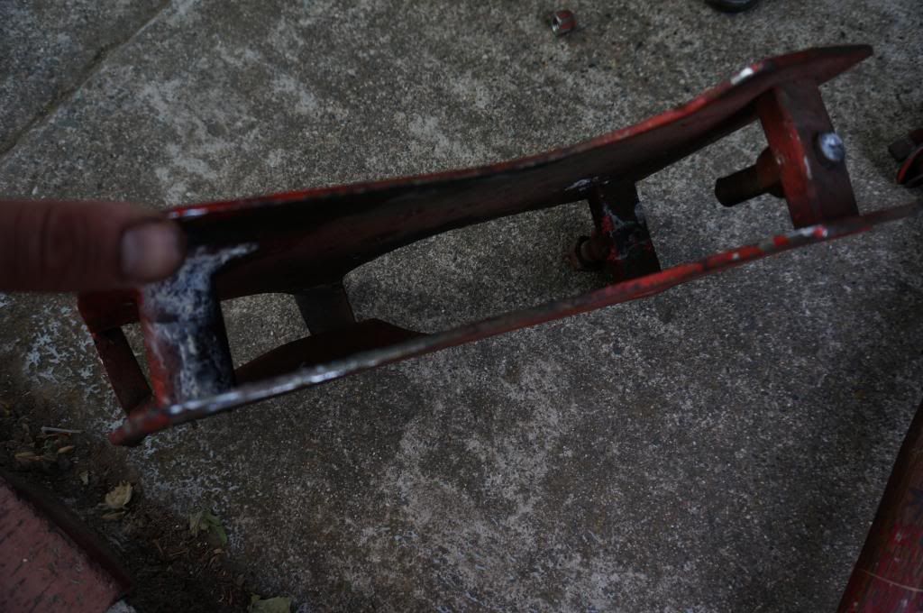 Identify Lower Trailing Arm Relocation Brackets w/ Locking Range Bolts